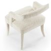 Upholstered boucle sand dining chair with open curved back