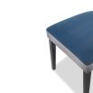 Blue and grey dining chair with padded seat