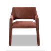 Rust dining chair with large tapered legs and wrap-around back