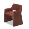 Rust dining chair with large tapered legs and wrap-around back