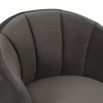 Upholstered dark grey velvet swivel chair with channelled detailing