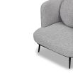 Grey chair with tall full wing back and accent cushion