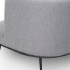 Boucle grey chair with tall full wing back and accent cushion