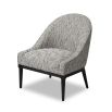 Grey chair with rounded backrest that melts into sloped armrests