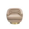 Curved back chair upholstered in light brown velvet