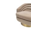 Curved back chair upholstered in light brown velvet