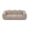 A luxury sofa by Liang & Eimil with a beautiful boucle upholstery and stunning shape