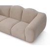 A luxury sofa by Liang & Eimil with a beautiful boucle upholstery and stunning shape