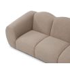 A luxury sofa by Liang & Eimil with a beautiful boucle upholstery and stunning shape