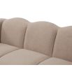 A luxury sofa by Liang & Eimil with a beautiful boucle upholstery and stunning shape