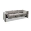 A stylish sofa by Liang & Eimil with an abstract shape and grey patterned upholstery