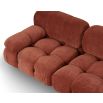 A statement sofa by Liang & Eimil with a modular design and soft red upholstery