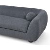 A contemporary sofa with two ball scatter cushions and a dark grey upholstery