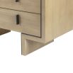 Light brown textured chest of drawers with dark frame and dark handles