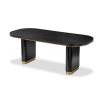 Bold black ash veneer dining table with brass accents