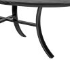 Oval shaped black ash dining table with curved legs