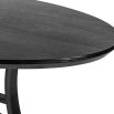 Oval shaped black ash dining table with curved legs