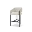 Squared wrap-around bar stool with neutral boucle upholstery and black frame