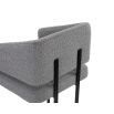 Squared wrap-around bar stool with boucle grey upholstery and black frame