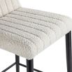 Gorgeous bar stool with fluting details and off-white upholstery