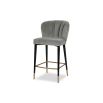 Art-deco inspired stool in dark grey velvet with fluting details and brass accents