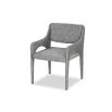 Elegant upholstered chair with arched supports and a complete fabric wrap in grey