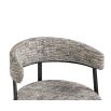 Minimal style dining chair in sherpa grey with rounded seat and curved backrest.