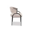 Elegant light grey upholstered dining chair with arched black steel legs