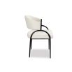 Elegant beige upholstered dining chair with arched black steel legs