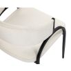 Elegant beige upholstered dining chair with arched black steel legs