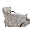 Elegant textured grey upholstered dining chair with arched black steel legs