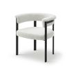 Elegant boucle upholstered dining chair in beige with black frame