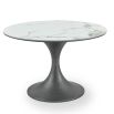 Curvaceous circular dining table with grey base and marble effect top