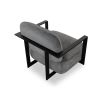 Dark grey upholstered armchair with angular black arms