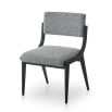 Black and white speckled upholstered chair with black frame