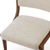 Scandi inspired dining chair with brown wood frame and cream upholstery