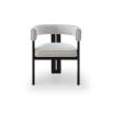 Grey linen armchair with rounded back and three black legs 