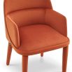 Dining chair with arms upholstered in rust red recycled fabric