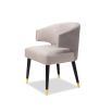 A luxury dining chair by Liang & Eimil with a sophisticated grey upholstery