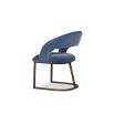 Curved back dining chair in blue velvet with bronze base frame