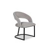 Curved back dining chair in grey velvet with black base frame