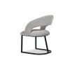 Curved back dining chair in grey velvet with black base frame