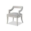 A sophisticated dining chair by Liang & Eimil with a gorgeous grey upholstery and open back design