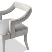 A sophisticated dining chair by Liang & Eimil with a gorgeous grey upholstery and open back design