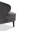 Grey chair with beautiful curves, tapered wenge wood legs and nail head trim accent