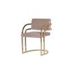 Beige velvet dining chair with art deco inspired arched arms in brass