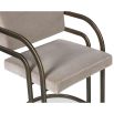 Dining chair upholstered in taupe velvet with art deco inspired arched arm rests