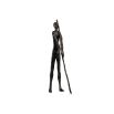 Iron sculpture of man holding large stick