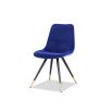 Royal blue velvet upholstered chair with tapered black legs and brass caps