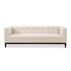 A luxury sofa by Liang & Eimil with a sophisticated design and beautiful beige upholstery